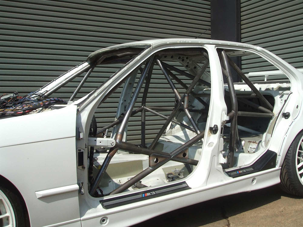 BMW E36 4dr Step 2 International Multipoint T45 roll cage kit. FIA Certificated