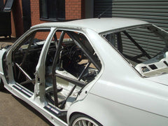 BMW E36 4dr Step 2 International Multipoint T45 roll cage kit. FIA Certificated
